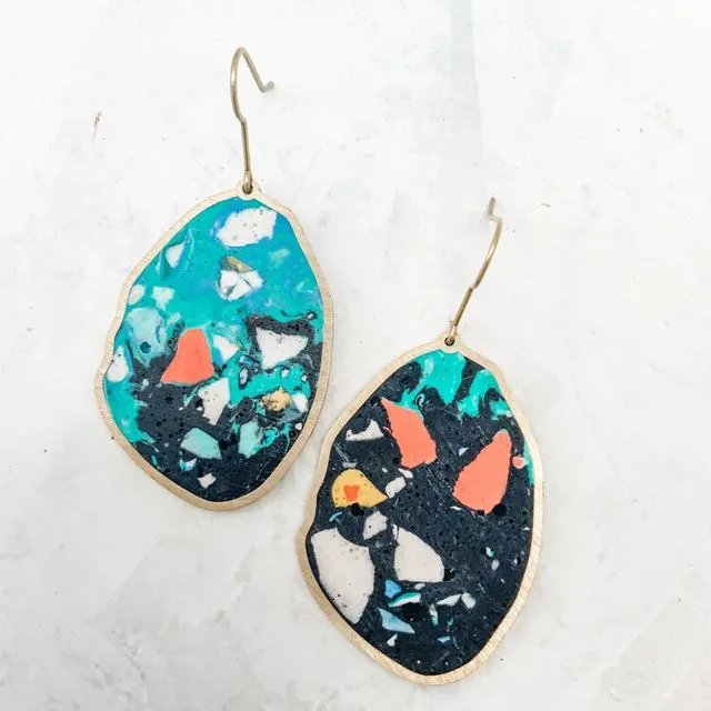 LARGE IRREGULAR OVALS IN BLACK, TURQUOISE AND TERRAZZO