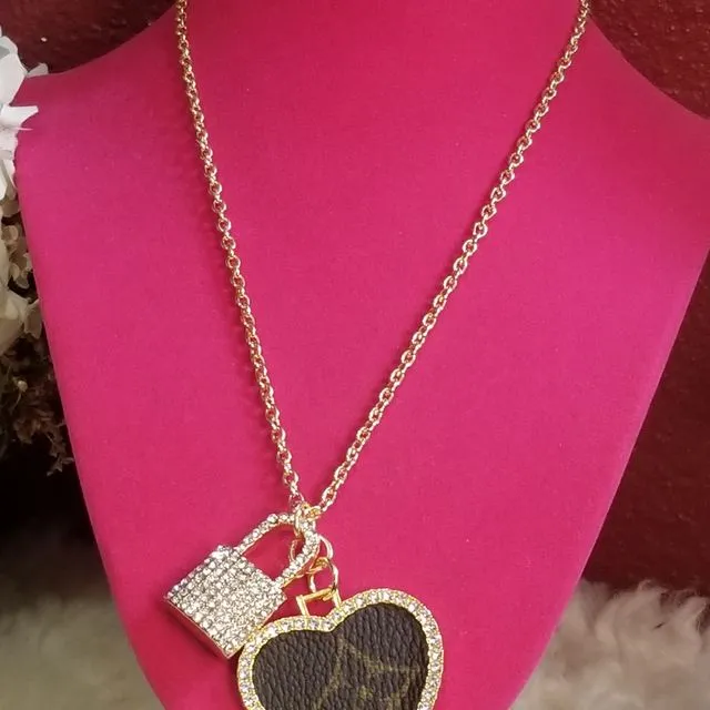 Gold lock and heart necklace