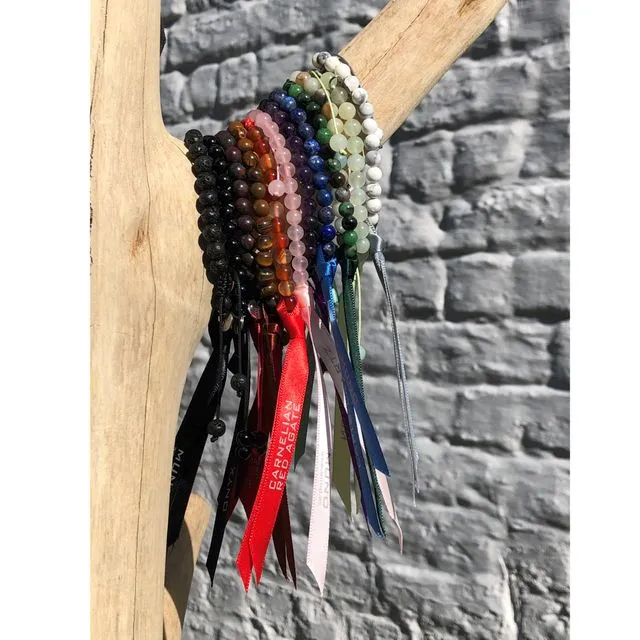 Bundle of 12 wax cord bracelets made of Semi-Precious Stones beads