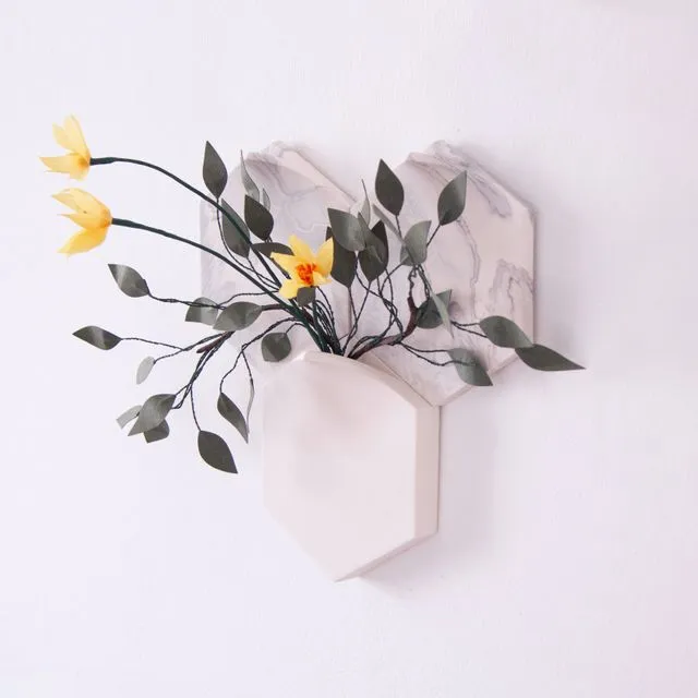Marbled tiles with modular wall-mount vase