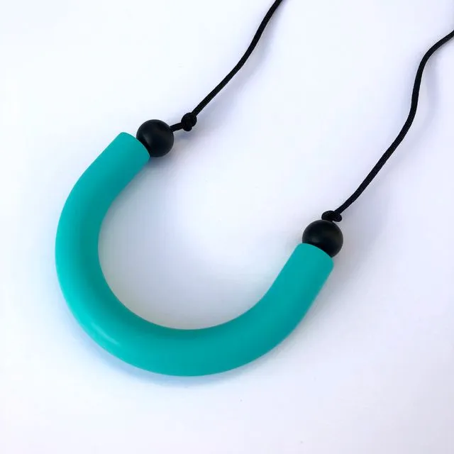 Turquoise U shaped teething pendant