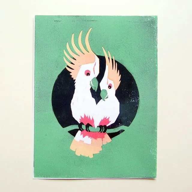 Hand-printed woodcut print with two cockatoos (green)