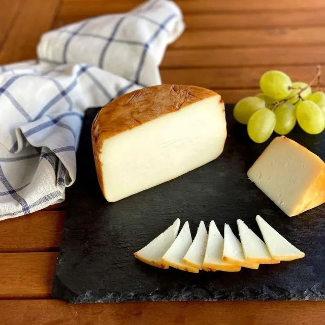 Semi-cured smoked goat cheese