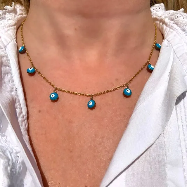 Necklace with a stainless golden metal chain and Turquoise eye pearls