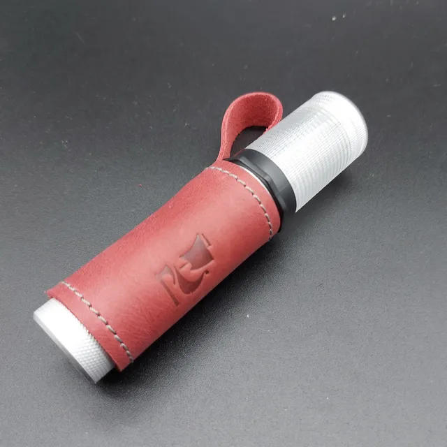 Flashlight for outdoor and indoor use, very light, resistant and very practical. With a leather sheath and hanger, belt clip. Opplav Torch.(Red)