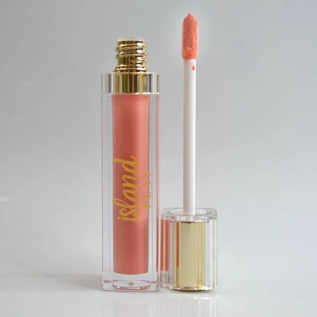 Peace & Gloss: A light, cream-toned nude pigmented lipgloss