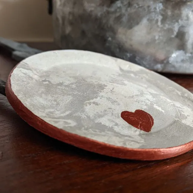 Marbled grey and white clay ring dish with a copper heart