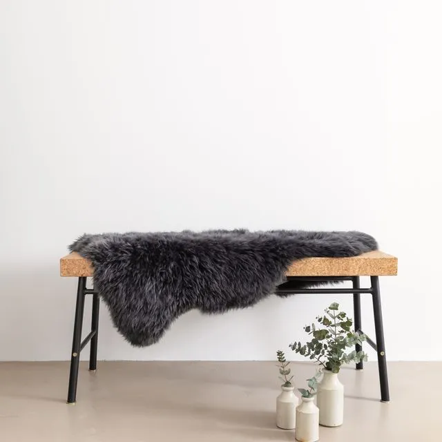 Ethically crafted sheepskin rug in Black