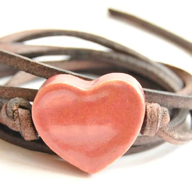 Bracelet leather cord with vintage pink heart