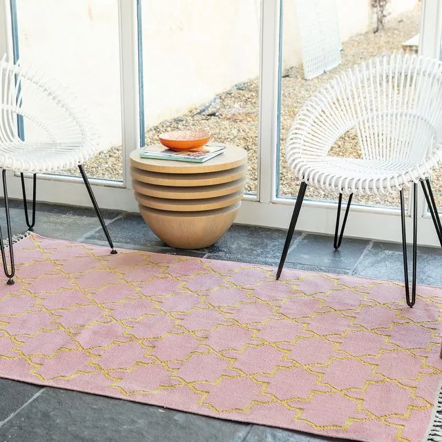 Pale pink and gold handwoven rug