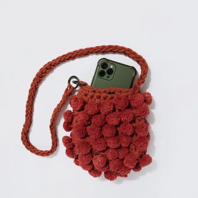 “Elise pom-pom” phone pouch - terracotta