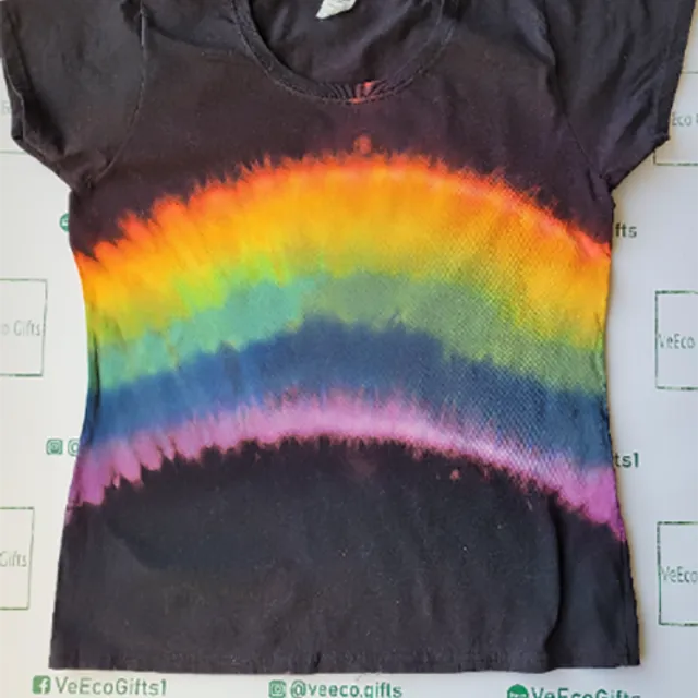 Mens hand tie dyed reverse rainbow on a black 100% cotton short sleeve T-shirt. Available in adult and children sizes