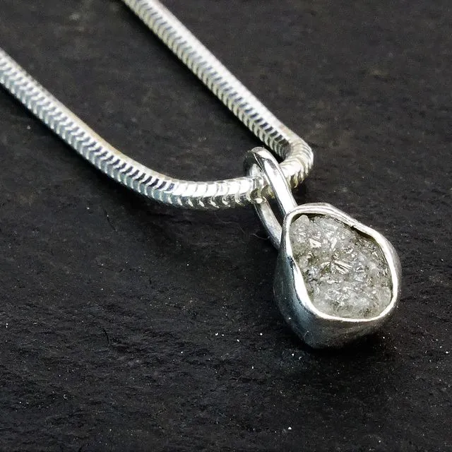 Raw silver diamond pendant