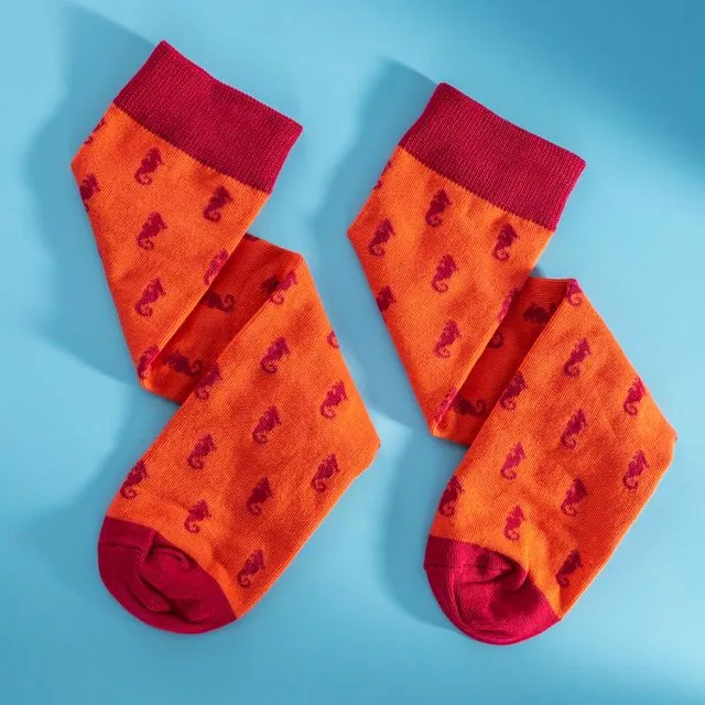 Red men's Egyptian cotton socks with sea horses on them