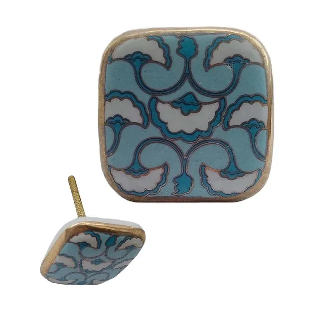 Cabinet knob blue tile