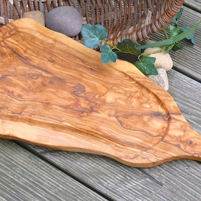Carving board with handle and juice groove (Length approx. 35 – 39 cm) olive wood