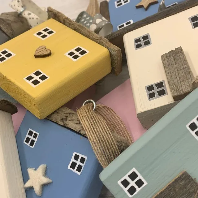 Wooden hanging houses, mixture of pastel colours