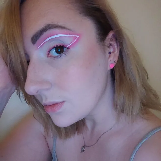 Neon pink mini circle earrings