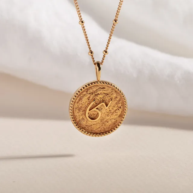 BRAVE GOLD SHORTHAND COIN NECKLACE