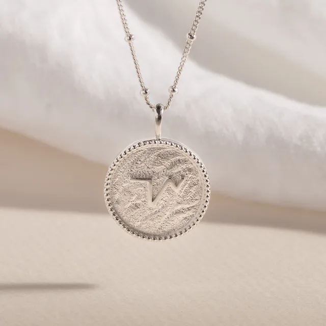 THRIVE SILVER SHORTHAND COIN NECKLACE