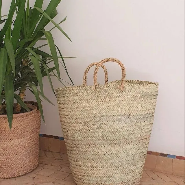 Braided wicker basket with handles
