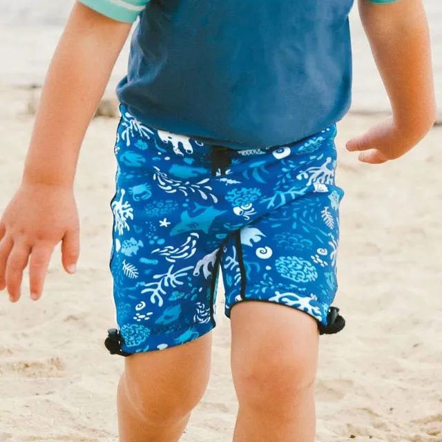 Blue Conni incontinence swim shorts for kids with print