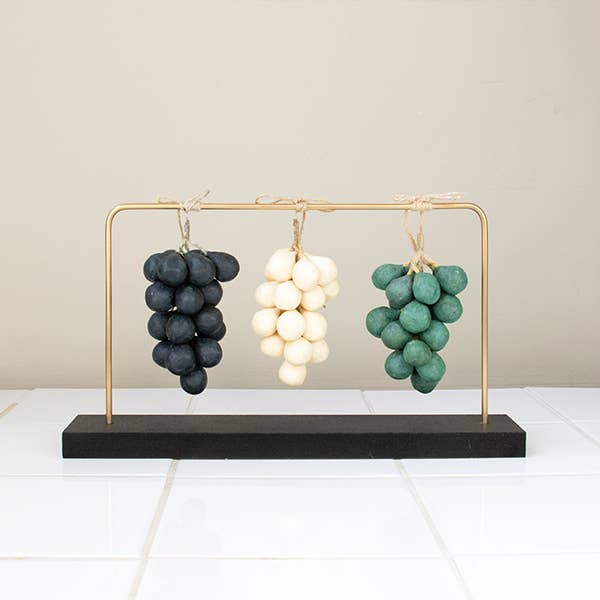 POS brass holder to display grape soaps