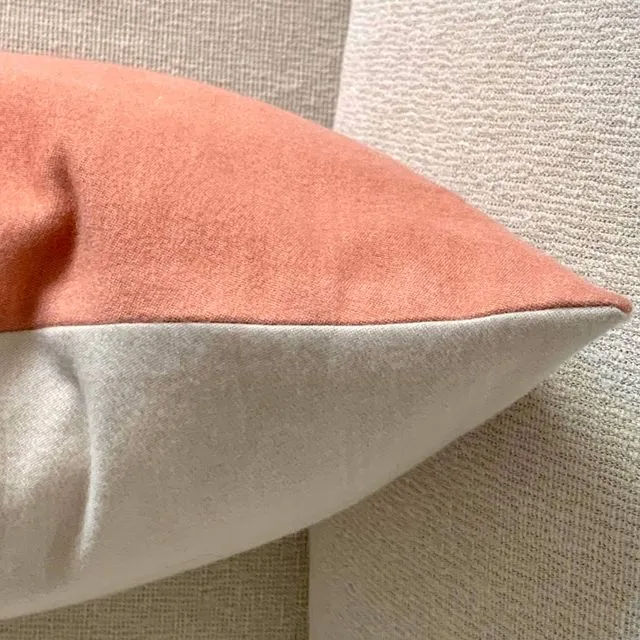 Bicolor pink and ecru bicolored silk wool pillow, an interior in duvet
