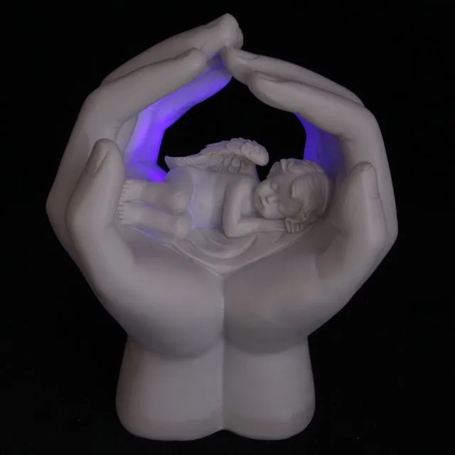 Sleeping Cherub in Hands with LED