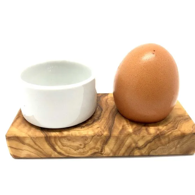 Troué PLUS egg holder made of olive wood