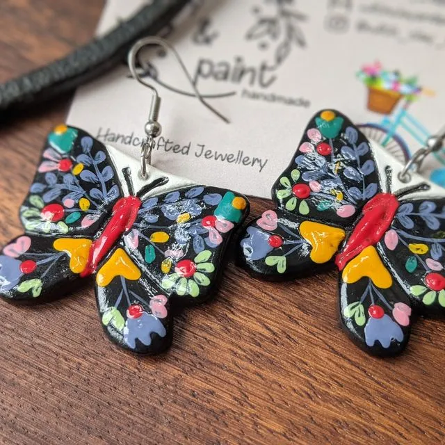 Black floral butterfly earrings