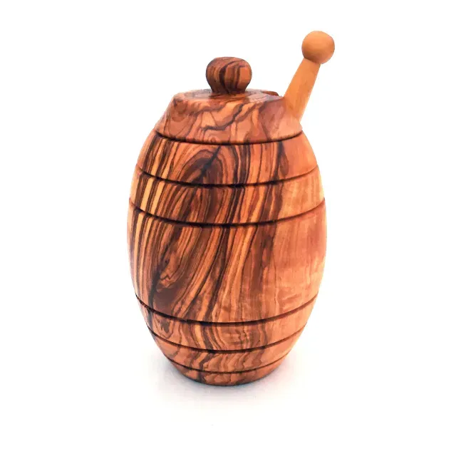 Honey pot with honey spoon made of olive wood