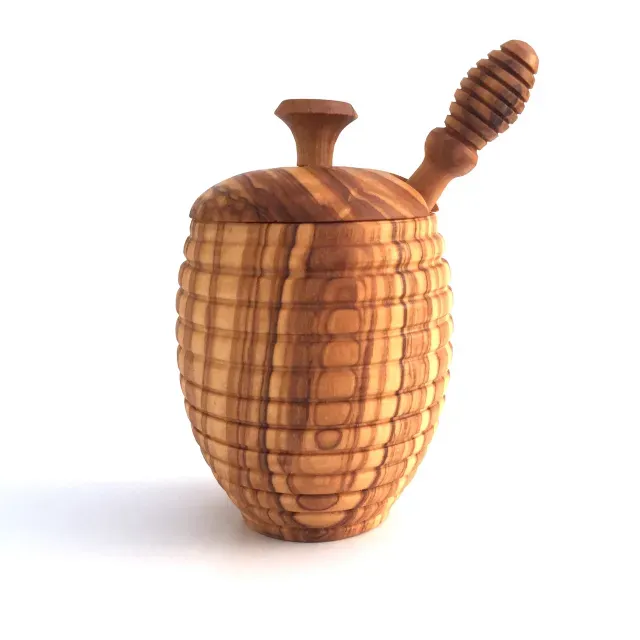 Honey pot with honey spoon and honey jar made of olive wood