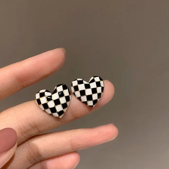 Black and white checkered love ear clips