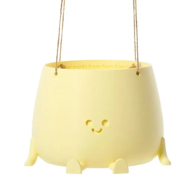 ECO-ELEGANCE: THE SUSTAINABLE HANGING HAPPY POT - MATTE ALMOND YELLOW